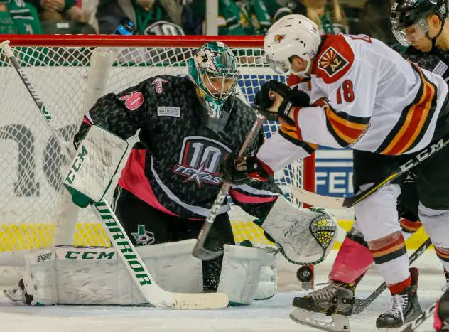 Texas Stars Goaltender Philippe Desrosiers stops a Tucson Roadrunners' shot attempt