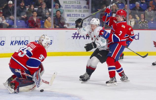 Bowen Byram of the Vancovuer Giants takes a shot against the Spokane Chiefs