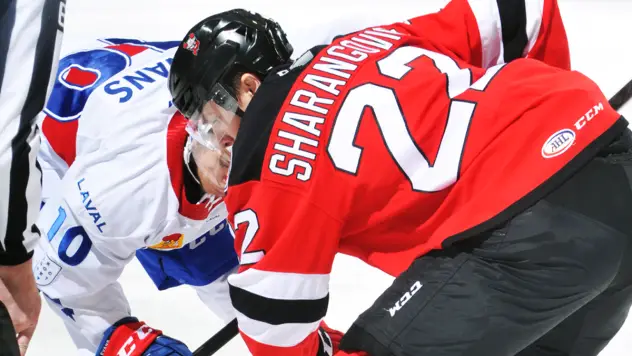 Egor Sharangovich of the Binghamton Senators faces off against the Laval Rocket