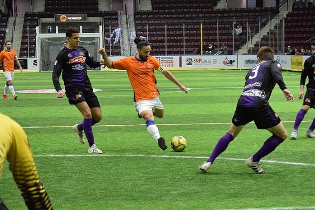 Mississauga MetroStars' Mo Babouli gets ready to strike against the Harrisburg Heat