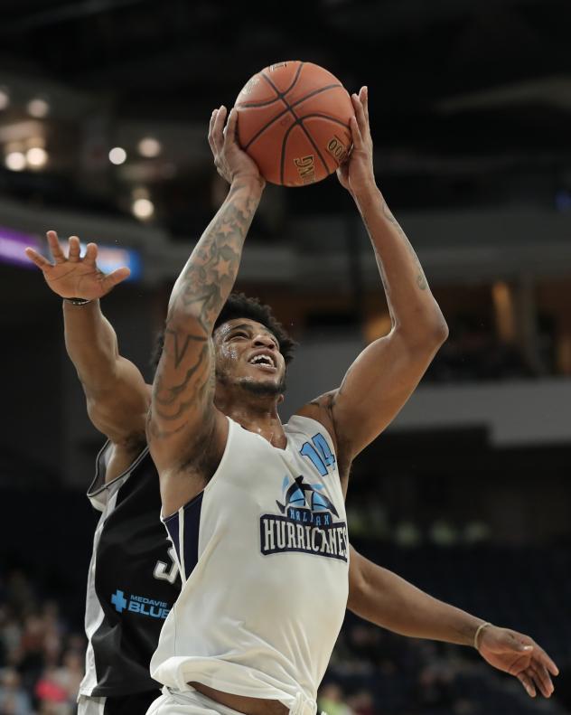 Halifax Hurricanes forward Jordan Washington goes up against the Moncton Magic