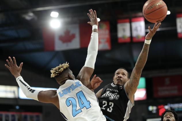 Halifax Hurricanes forward Meshack Lufile defends against the Moncton Magic