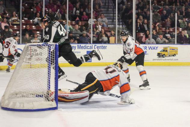 Utah Grizzlies forward Caleb Herbert scores against the Kansas City Mavericks