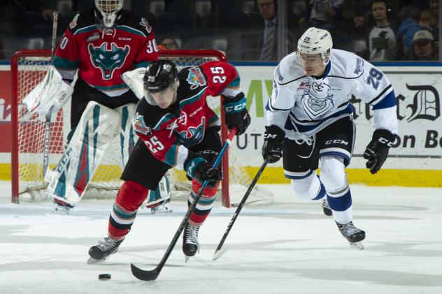 Kelowna Rockets centre Kyle Crosbie races up the ice with the puck against the Victoria Royals