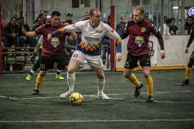 Tacoma Stars forward Nick Perera possesses the ball against the Turlock Express