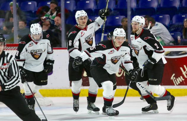 Vancouver Giants defenceman Tyler Bulich and his teammates after a goal