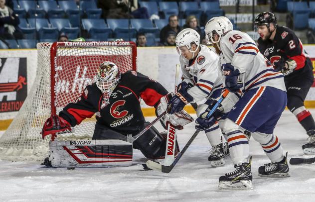 Prince George Cougars goaltender Taylor Gauthier eyes the puck against the Kamloops Blazers