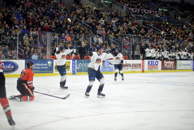 Sioux Falls Fighting Wiener Dogs celebrate a win over the Omaha Lancers