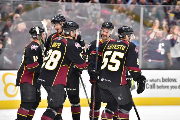 Cleveland Monsters celebrate an overtime win