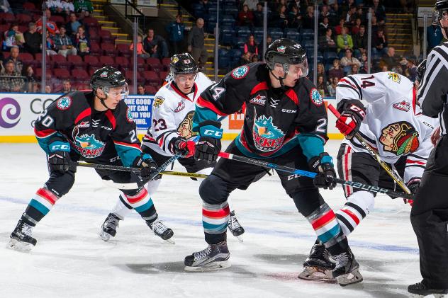 Kelowna Rockets left wing Conner Bruggen-Cate (20) and center Kyle Topping vs. the Portland Winterhawks