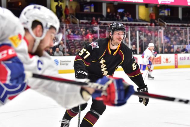 Cleveland Monsters left wing Paul Bittner (57) vs. the Laval Rocket