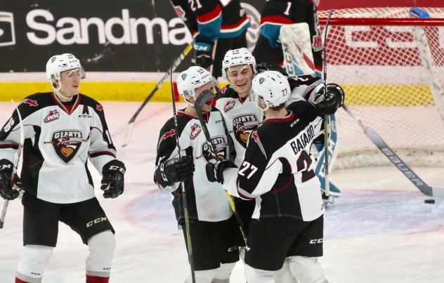 The Vancouver Giants celebrate a Nic Draffin goal vs. the Kelowna Rockets