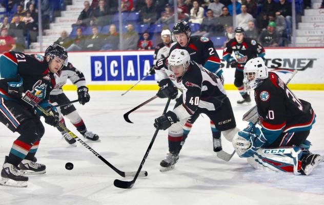 Vancouver Giants center Milos Roman skates through the Kelowna Rockets defense