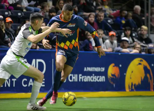 Tacoma Stars midfielder Michael Ramos dribbles against the El Paso Coyotes