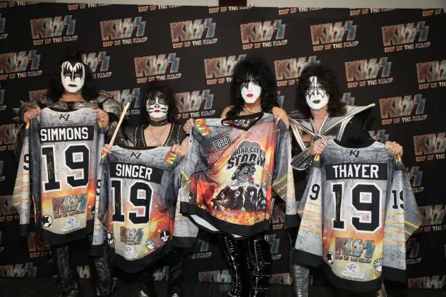 Legendary band KISS holds their Quad City Storm jerseys