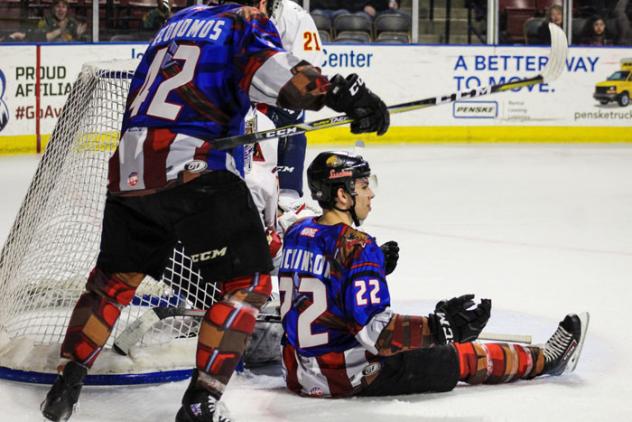 Josh Dickinson of the Utah Grizzlies (seated)