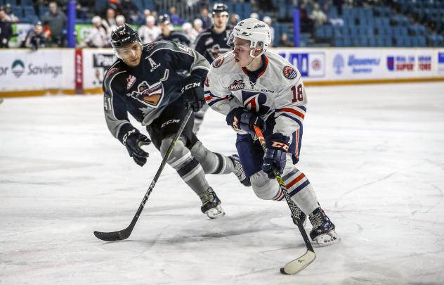 Vancouver Giants defenceman Alex Kannok Leipert (left) vs. the Kamloops Blazers