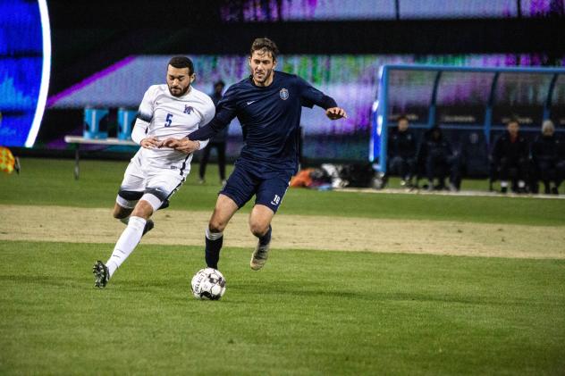 Memphis 901 FC forward Elliot Collier (right)