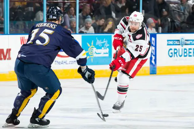 Grand Rapids Griffins left wing Chris Terry (right) vs. the Milwaukee Admirals