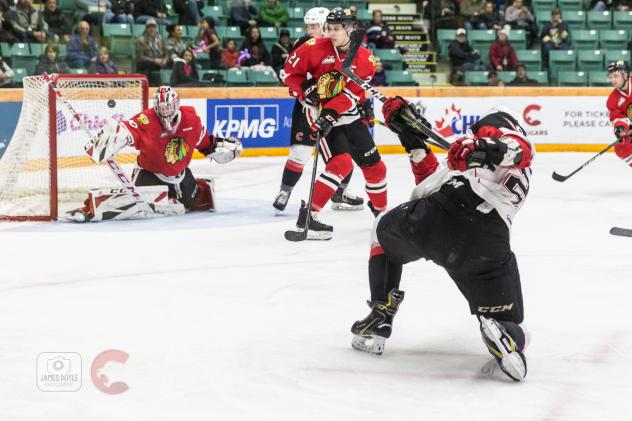 Prince George Cougars rip a shot at the Portland Winterhawks