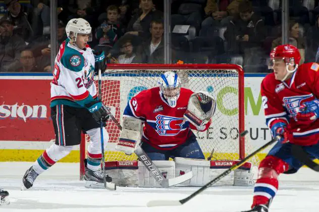 Kelowna Rockets right wing Leif Mattson sets up in front of the Spokane Chiefs goal
