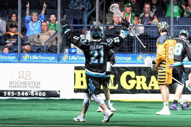 Chris Boushy of the Rochester Knighthawks celebrates a goal against the Georgia Swarm