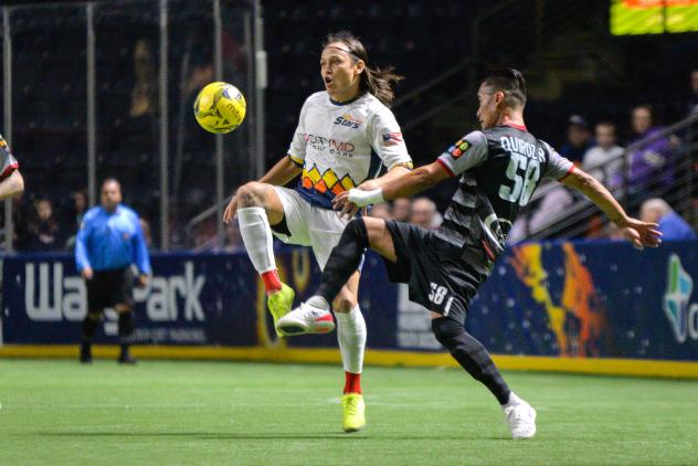 Victor Quiroz of the Ontario Fury (right) battles for possession against the Tacoma Stars