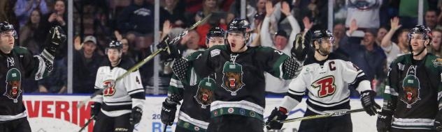 Utah Grizzlies celebrate a goal against the Rapid City Rush