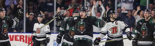 Utah Grizzlies celebrate a goal against the Rapid City Rush