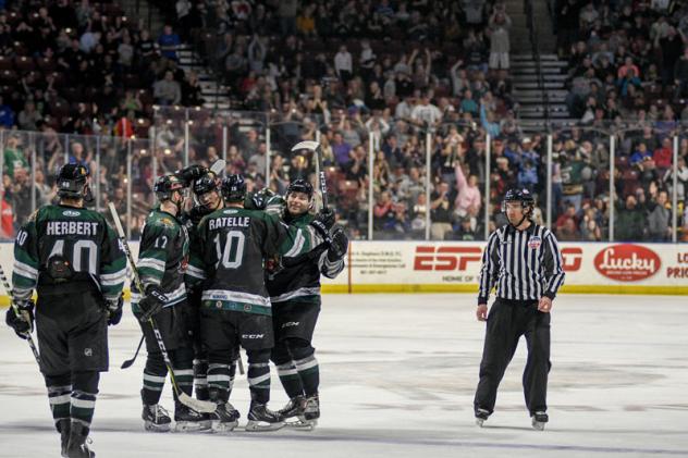 Utah Grizzlies celebrate a goal against the Rapid City Rush