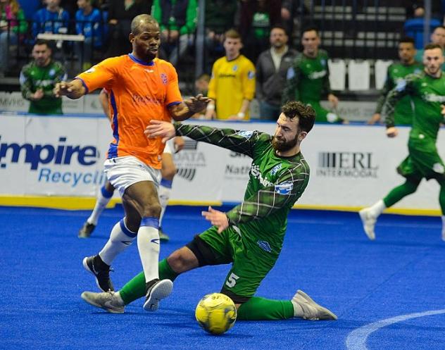 Mississauga MetroStars' Halburto Harris (left) challenges Utica City FC's Domenico Vitale for the ball