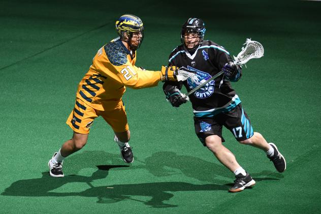 Ryan Benesch of the Rochester Knighthawks (right) against the Georgia Swarm