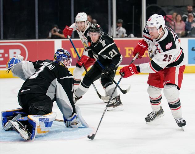 Grand Rapids Griffins left wing Chris Terry (right) eyes a shot against the San Antonio Rampage