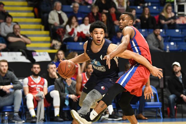 Halifax Hurricanes guard Malcolm Duvivier drives around the Cape Breton Highlanders