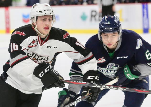 Davis Koch of the Vancouver Giants (left) vs. the Seattle Thunderbirds