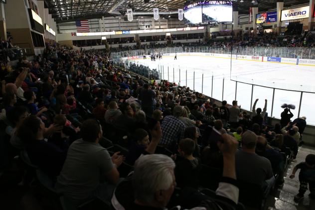 Fans watch the Tri-City Storm at the Viaero Center