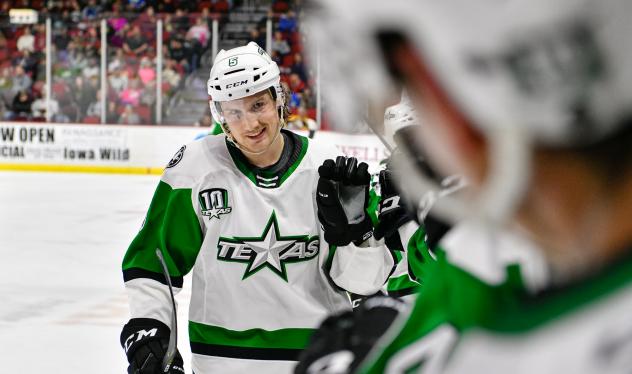 Texas Stars exchange congratulations along the bench