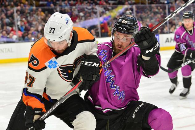 Lehigh Valley Phantoms defenseman Mark Friedman (left) against the Cleveland Monsters