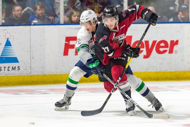 Vancouver Giants defenceman Seth Bafaro (right) vs. the Seattle Thunderbirds