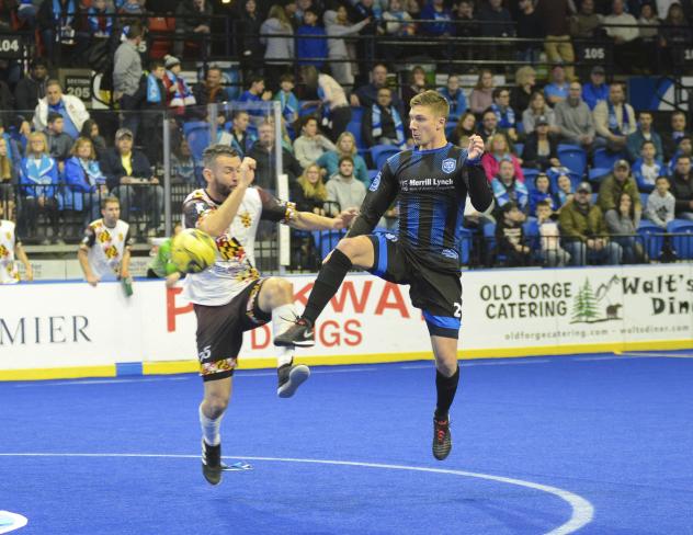 Elton de Oliveira of the Baltimore Blast (left) battles Utica City FC