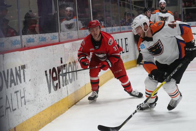 Lehigh Valley Phantoms defenseman Reece Willcox (right) vs. the Charlotte Checkers