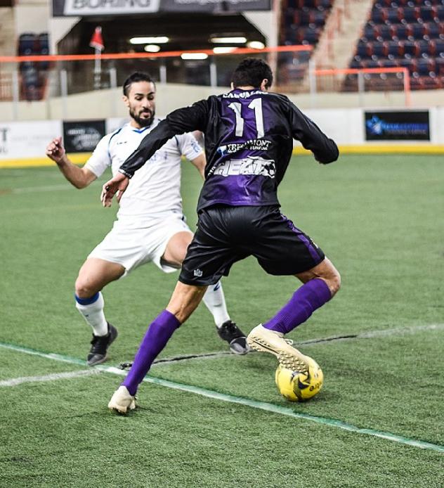 Mississauga MetroStars' Mo Babouli (white) in action last week vs Harrisburg Heat's Ricardo Carvalho