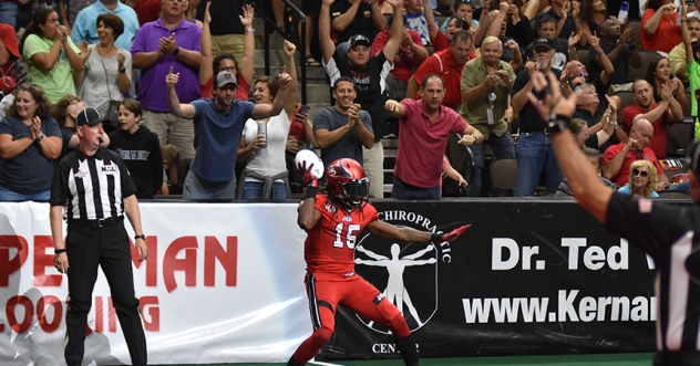 Jacksonville Sharks fans react to a touchdown