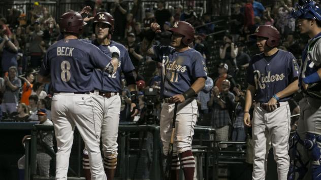 Frisco RoughRiders congratulate Preston Beck after his home run