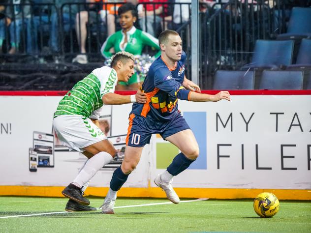Tacoma Stars forward Nick Perera escapes the Dallas Sidekicks