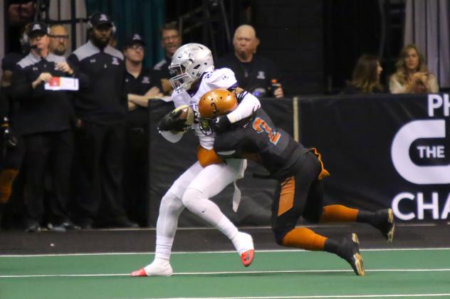 Jamal Miles of the Arizona Rattlers makes a tackle against the San Diego Strike Force
