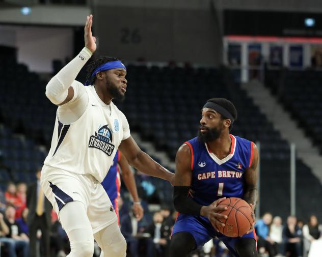 Halifax Hurricanes centre Rhamel Brown (left) vs. the Cape Breton Highlanders