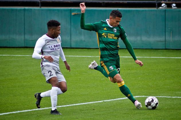 Sacramento Republic FC defender Shannon Gomez (left) vs. Portland Timbers 2