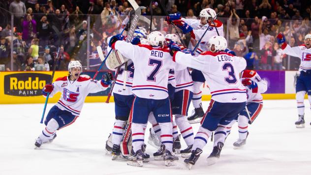 Spokane Chiefs celebrate after advancing past the Everett Silvertips