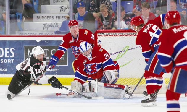 Vancouver Giants centre Jadon Joseph tests the Spokane Chiefs defense